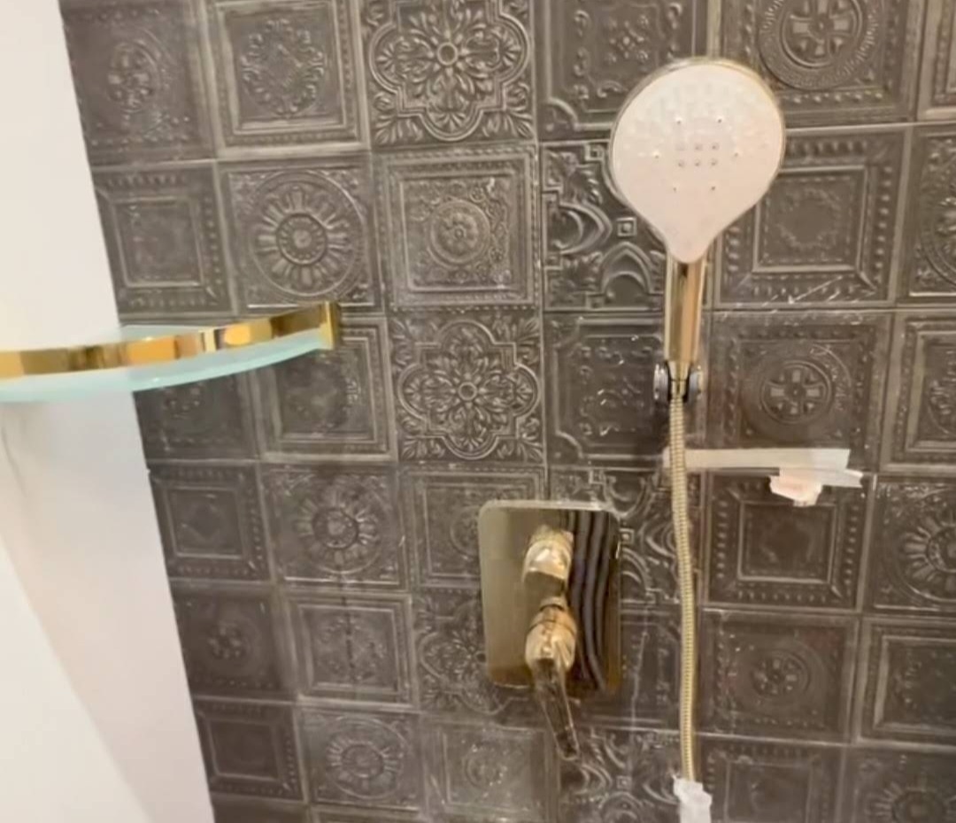 Premium shower installation with ornate tile work